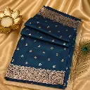 Elegant Teal Blue Banarasi Silk Saree with Silver Zari Buta & Floral Border