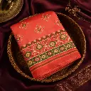Coral Orange Patola Print Saree with Green Border