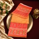 Orange & Peach Bandhani Printed Saree with Traditional Woven Border