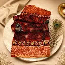 Women's Rust Red Printed Saree with Traditional Border